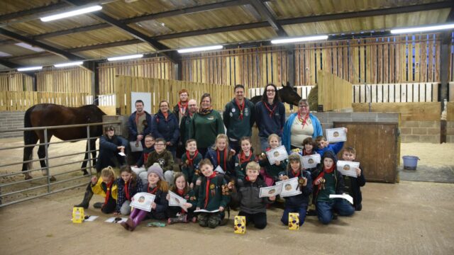 Group of cubs with certificates