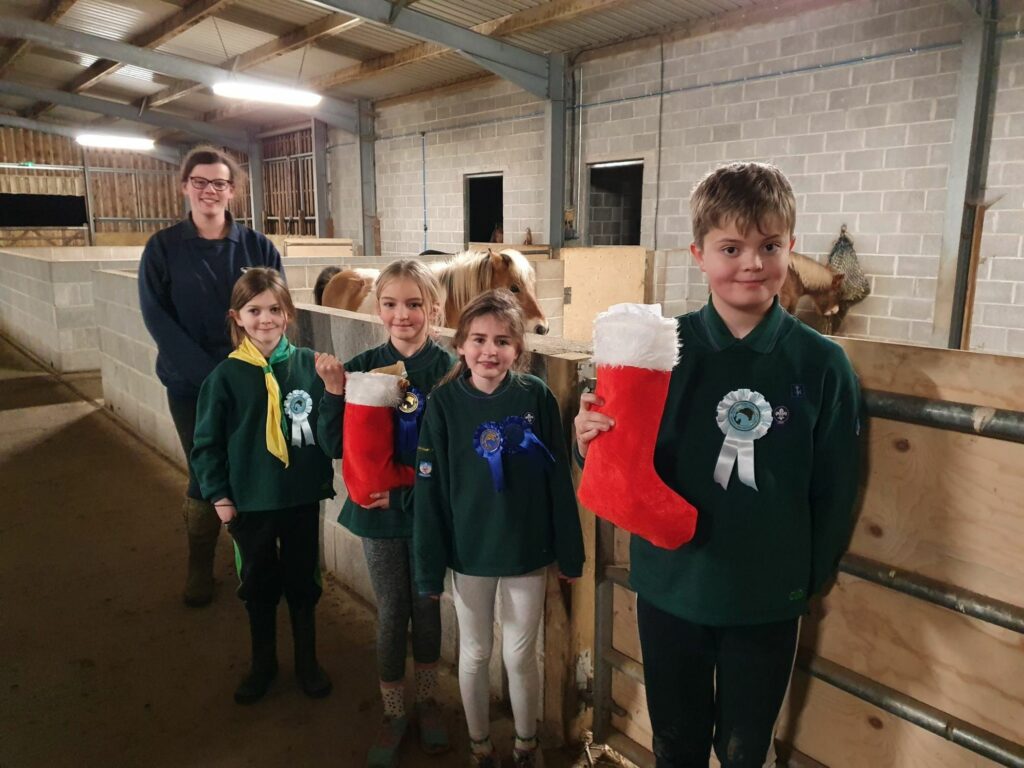 Beavers and Cubs with Christmas stocking